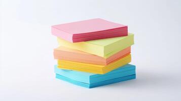 Stacked colorful sticky notes on a white background for organization and creativity photo