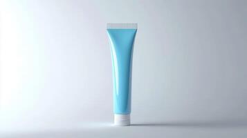 Blue cosmetic tube on a light gray background showcasing modern design and clean aesthetics photo