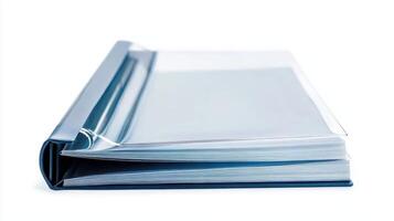 Clear binder with stacked sheets on a white background showcasing an organized document setup photo