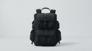 Stylish black backpack designed with multiple compartments and padded straps, displayed against a minimalist backdrop photo