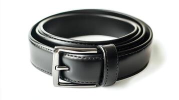 Black leather belt with a silver buckle displayed against a white background photo