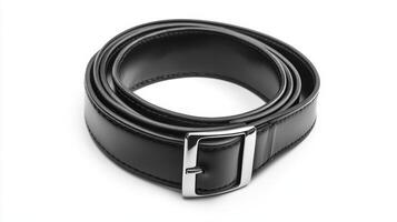 Black leather belt with a silver buckle lying on a white background photo
