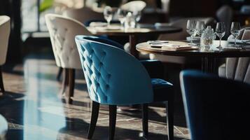 Elegant Dining Room With Stylish Chairs and Fine Table Settings in Luxurious Restaurant During Late Afternoon photo