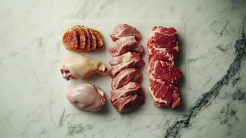 Fresh Cuts of Pork and Chicken on a Marble Cutting Board in a Bright Kitchen photo
