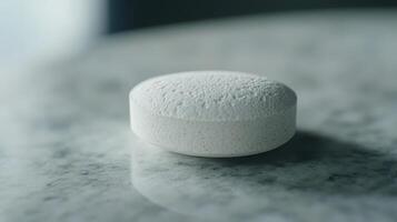 White Effervescent Tablet on Marble Surface in Soft Natural Light During Morning Hours photo