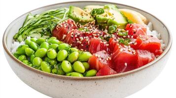 Fresh tuna poke bowl with avocado, edamame, and cucumber, served in a ceramic bowl, showcasing vibrant colors and textures photo