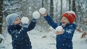 Children playing with snowballs in a snowy forest setting during winter photo