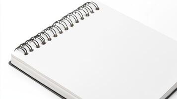 Blank spiral-bound notebook resting on a flat surface ready for sketches or notes photo