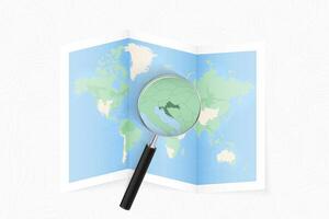 Enlarge Croatia with a magnifying glass on a folded map of the world. vector