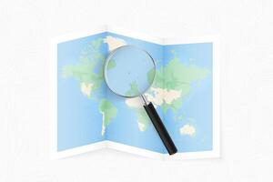 Enlarge Faroe Islands with a magnifying glass on a folded map of the world. vector