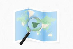 Enlarge Spain with a magnifying glass on a folded map of the world. vector