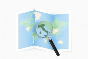 Enlarge Italy with a magnifying glass on a folded map of the world. vector