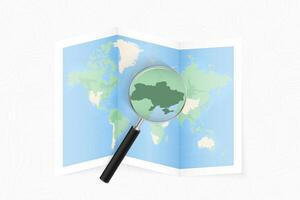 Enlarge Ukraine with a magnifying glass on a folded map of the world. vector