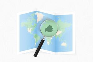 Enlarge Belarus with a magnifying glass on a folded map of the world. vector