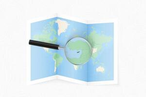 Enlarge Cyprus with a magnifying glass on a folded map of the world. vector