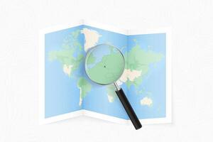 Enlarge Luxembourg with a magnifying glass on a folded map of the world. vector