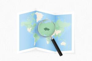 Enlarge Czech Republic with a magnifying glass on a folded map of the world. vector