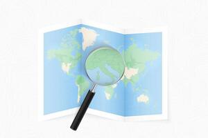 Enlarge San Marino with a magnifying glass on a folded map of the world. vector
