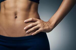 Close up of torso smooth skin, natural hair, gradient background, studio setting photo