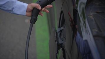 This is a CloseUp of an Electric Vehicle Charging Station for all types of users and vehicles video