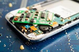 Repairing and upgrade circuit mainboard of notebook, electronic, computer hardware and technology concept. photo