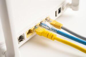 Ethernet cable with wireless router connect to internet service provider internet network. photo
