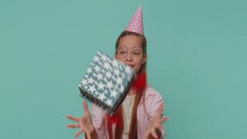 Smiling girl receiving gift box, amazed satisfied with nice present, unexpected birthday surprise video