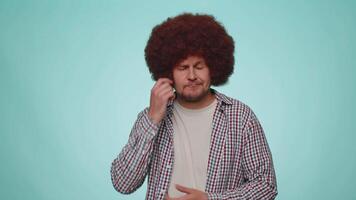 Confused man feeling embarrassed about ambiguous question, having doubts, no idea clueless uncertain video