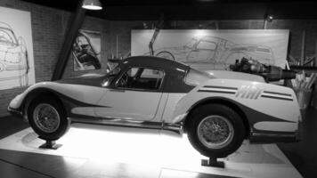 Turin, Italy - June 20, 2021. a glimpse of an antique automobile sports at the Automobile Museum. photo