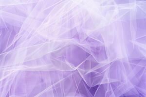 A delicate, sheer tulle texture creates a soft and airy background photo