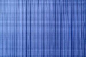 A seersucker texture background features alternating smooth and puckered stripes, creating a crinkled, wavy appearance photo