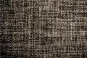 A hessian texture background features a coarse, woven appearance with a rustic and earthy feel photo