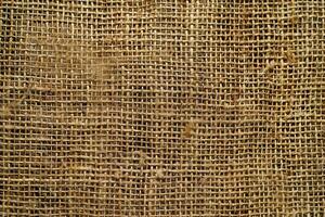 A coarse, natural jute texture background with a rustic and earthy appearance photo