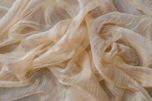 A voile texture background features a light, sheer fabric with a soft, smooth surface and a semi-transparent appearance photo