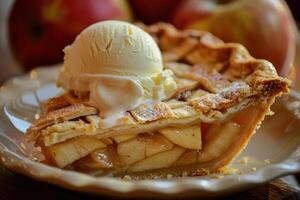 A slice of apple pie topped with a generous scoop of vanilla ice cream photo