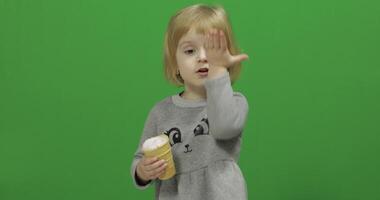 Kid girl with ice cream on a Green Screen, Chroma Key video