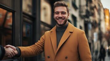 Confident young man in a stylish coat photo