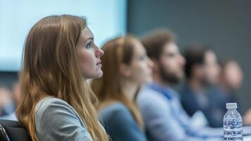 People listening to a conference in a meeting room photo