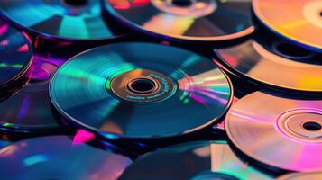 Colorful stack of CDs in a chaotic pile photo