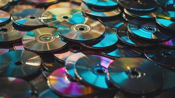 Colorful stack of CDs in a chaotic pile photo