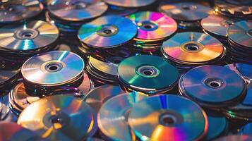 Colorful stack of CDs in a chaotic pile photo