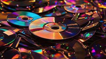 Colorful stack of CDs in a chaotic pile photo