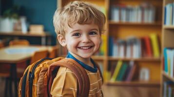 Happy kindergarten student on the first day of school. photo