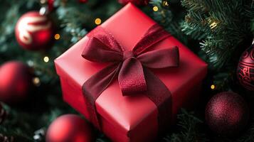 Close-up of a red gift box with a bow photo