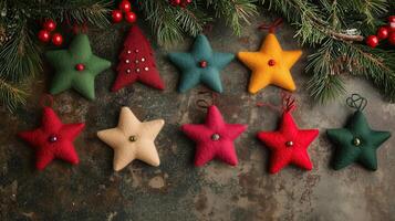 Handmade felt Christmas decorations in star and tree shapes photo