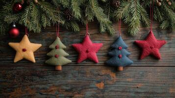 Handmade felt Christmas decorations in star and tree shapes photo