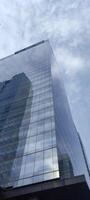 Skyscraper bottom view, glass building photo