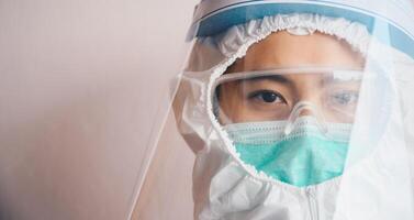 Cropped shot of confidence healthcare worker while wearing PPE suit before working in hospital during Covid-19 pandemic. photo