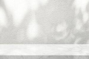 White Marble Table with Tree Shadow on Concrete Wall Texture Background photo