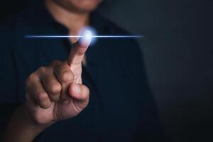 Businessman using finger touching on virtual screen. Futuristic business and IT presentation background. Space for text. Innovation technology computer and business concept photo
